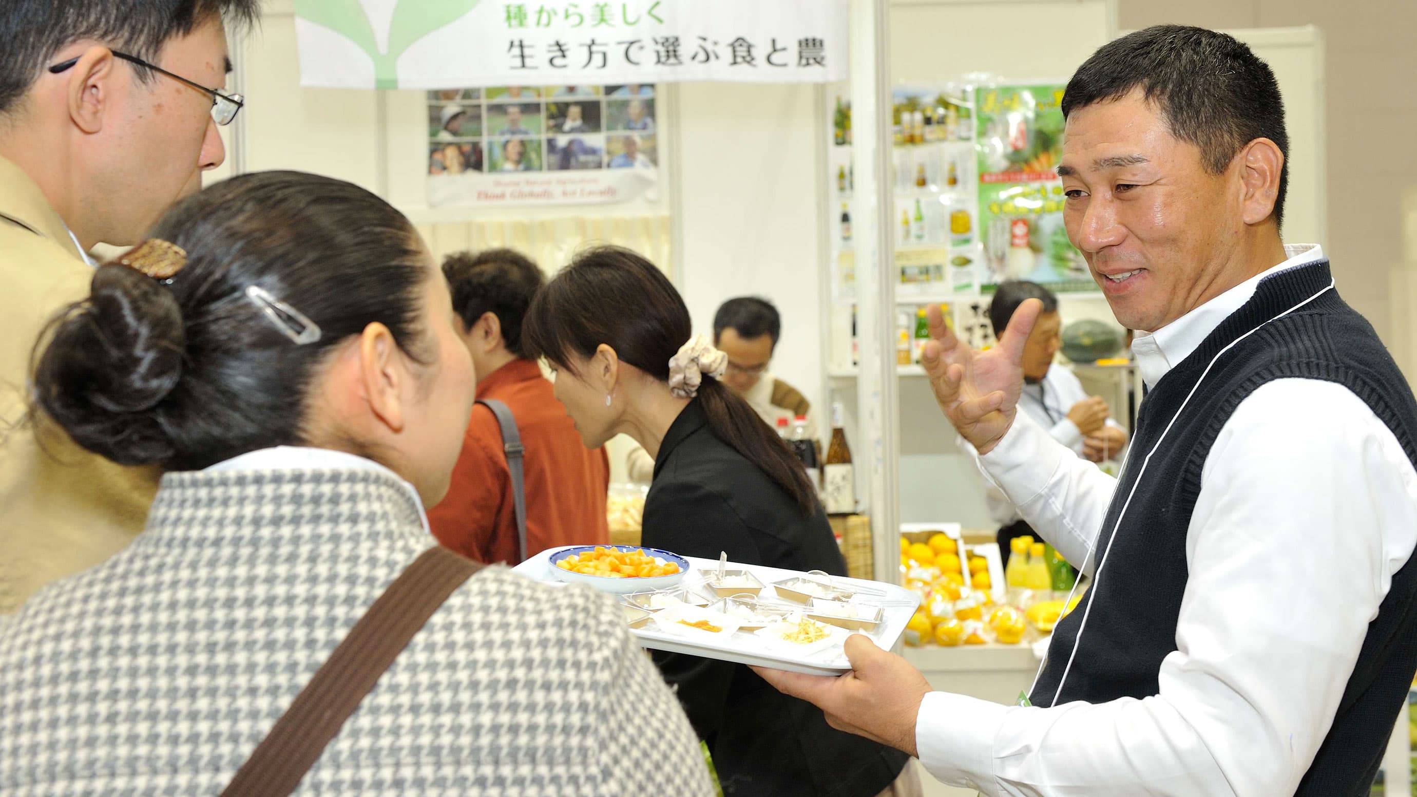 Exhibitor shows his product